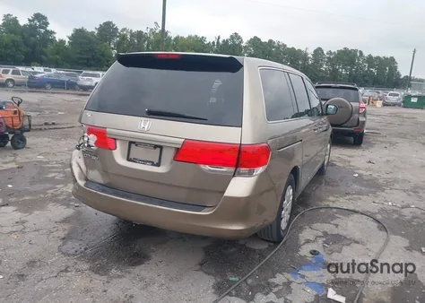 2010 Honda Odyssey Lx z USA, uszkodzony, nr VIN 5FNRL3H29AB009627